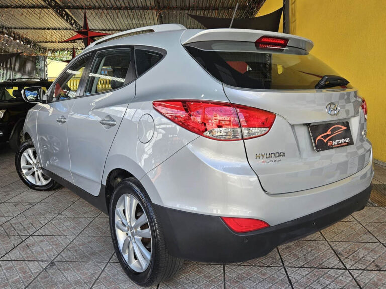 4-HYUNDAI-IX35-2.0-MPI-4X2-16V-FLEX-4P-AUTOMÁTICO-PRATA-2013-RR-AUTOMOVEIS-LOJA-DE-CARROS-FREGUESIA-DO-O-AVENIDA-PETRONIO-PORTELA